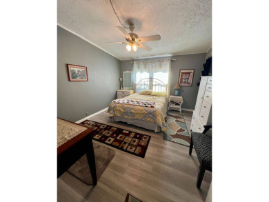 Charming, Fully Furnished Home - Move-In Ready! Step into on Lake Henry Golf Club in Florida - for sale on GolfHomes.com, golf home, golf lot