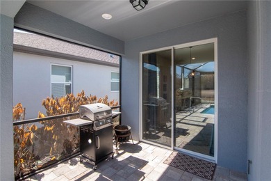 2021 BUILT POOL HOME with POND VIEWS, HURRICANE IMPACT WINDOWS on Silverado Golf and Country Club in Florida - for sale on GolfHomes.com, golf home, golf lot