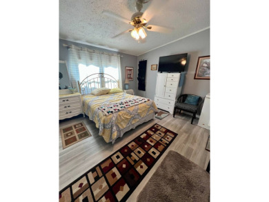 Charming, Fully Furnished Home - Move-In Ready! Step into on Lake Henry Golf Club in Florida - for sale on GolfHomes.com, golf home, golf lot
