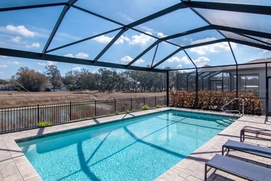 2021 BUILT POOL HOME with POND VIEWS, HURRICANE IMPACT WINDOWS on Silverado Golf and Country Club in Florida - for sale on GolfHomes.com, golf home, golf lot