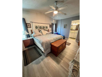 Charming, Fully Furnished Home - Move-In Ready! Step into on Lake Henry Golf Club in Florida - for sale on GolfHomes.com, golf home, golf lot