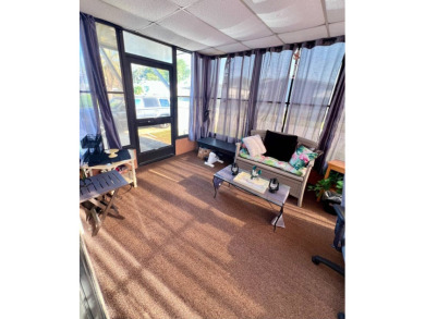 Charming, Fully Furnished Home - Move-In Ready! Step into on Lake Henry Golf Club in Florida - for sale on GolfHomes.com, golf home, golf lot
