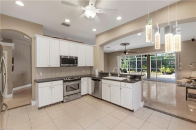 Experience resort-style living in this stunning two-bedroom + on Spanish Wells Golf and Country Club in Florida - for sale on GolfHomes.com, golf home, golf lot