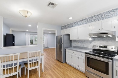 This end unit Barnett model offers a convenient location near on Leisure Village East in New Jersey - for sale on GolfHomes.com, golf home, golf lot