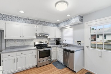 This end unit Barnett model offers a convenient location near on Leisure Village East in New Jersey - for sale on GolfHomes.com, golf home, golf lot