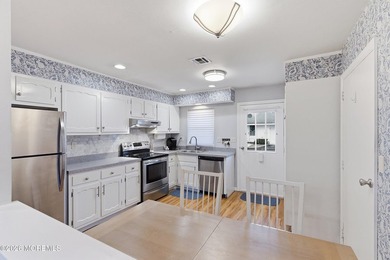 This end unit Barnett model offers a convenient location near on Leisure Village East in New Jersey - for sale on GolfHomes.com, golf home, golf lot