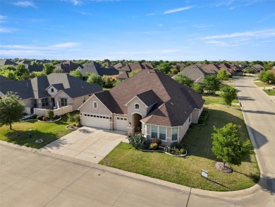 Discover this stunning one-story Ashland model, perfectly on Wildhorse Golf Club of Robson Ranch in Texas - for sale on GolfHomes.com, golf home, golf lot
