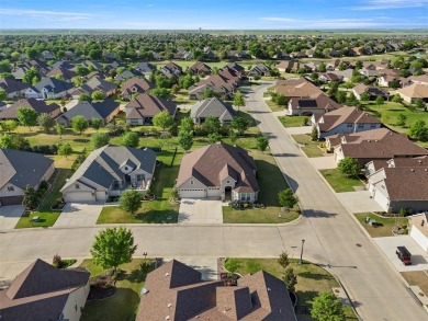 Discover this stunning one-story Ashland model, perfectly on Wildhorse Golf Club of Robson Ranch in Texas - for sale on GolfHomes.com, golf home, golf lot