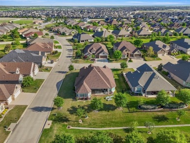 Discover this stunning one-story Ashland model, perfectly on Wildhorse Golf Club of Robson Ranch in Texas - for sale on GolfHomes.com, golf home, golf lot