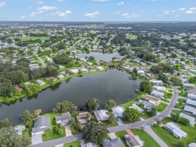 Priced to sell!!!! No Bond. Located on Paradise Lake, nestled in on Orange Blossom Hills Golf and Country Club in Florida - for sale on GolfHomes.com, golf home, golf lot