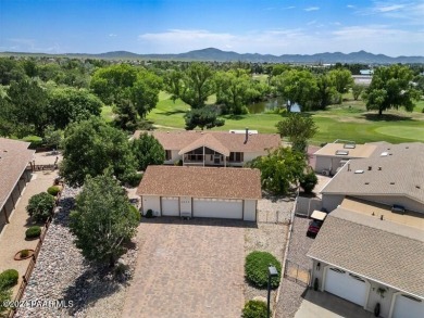 Rare Opportunity to own an extraordinary home adjacent to on Quail Wood Greens Golf Course in Arizona - for sale on GolfHomes.com, golf home, golf lot