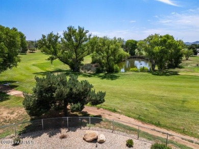 Rare Opportunity to own an extraordinary home adjacent to on Quail Wood Greens Golf Course in Arizona - for sale on GolfHomes.com, golf home, golf lot