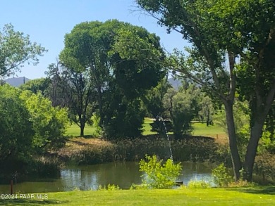 Rare Opportunity to own an extraordinary home adjacent to on Quail Wood Greens Golf Course in Arizona - for sale on GolfHomes.com, golf home, golf lot