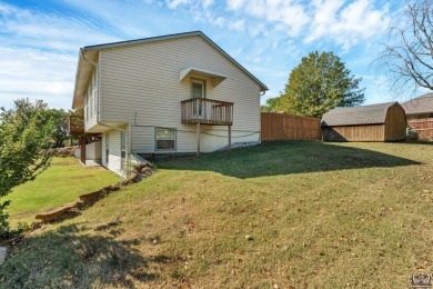 Discover this delightful home with picturesque views of the on Lake Perry Country Club in Kansas - for sale on GolfHomes.com, golf home, golf lot