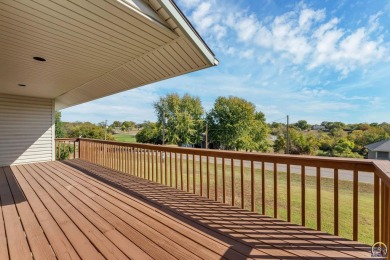 Discover this delightful home with picturesque views of the on Lake Perry Country Club in Kansas - for sale on GolfHomes.com, golf home, golf lot