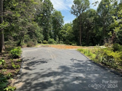 Experience relaxed luxury living in Flat Rock's premier on Kenmure Country Club in North Carolina - for sale on GolfHomes.com, golf home, golf lot