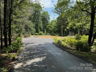 Experience relaxed luxury living in Flat Rock's premier on Kenmure Country Club in North Carolina - for sale on GolfHomes.com, golf home, golf lot