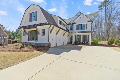 Enjoy Lakeside living in this elegant 5 BR / 3.5 BA Lake access on The Golf Club at Cuscowilla in Georgia - for sale on GolfHomes.com, golf home, golf lot