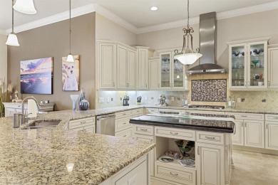 Welcome to your dream home--an elegant three-bedroom on Lakewood Ranch Golf and Country Club in Florida - for sale on GolfHomes.com, golf home, golf lot