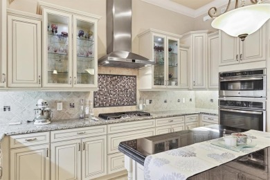 Welcome to your dream home--an elegant three-bedroom on Lakewood Ranch Golf and Country Club in Florida - for sale on GolfHomes.com, golf home, golf lot