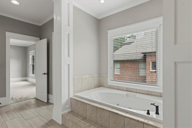 This magnificent home seamlessly blends modern design with on Hamilton Mill Golf Club in Georgia - for sale on GolfHomes.com, golf home, golf lot