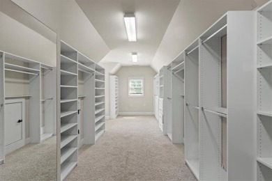 This magnificent home seamlessly blends modern design with on Hamilton Mill Golf Club in Georgia - for sale on GolfHomes.com, golf home, golf lot