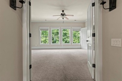 This magnificent home seamlessly blends modern design with on Hamilton Mill Golf Club in Georgia - for sale on GolfHomes.com, golf home, golf lot