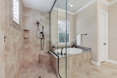 Welcome to your dream home--an elegant three-bedroom on Lakewood Ranch Golf and Country Club in Florida - for sale on GolfHomes.com, golf home, golf lot