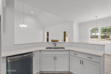 This newly constructed home is located in the community of Seven on Beacon Ridge Golf and Country Club in North Carolina - for sale on GolfHomes.com, golf home, golf lot