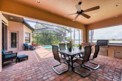 Welcome to your dream home--an elegant three-bedroom on Lakewood Ranch Golf and Country Club in Florida - for sale on GolfHomes.com, golf home, golf lot