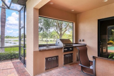 Welcome to your dream home--an elegant three-bedroom on Lakewood Ranch Golf and Country Club in Florida - for sale on GolfHomes.com, golf home, golf lot