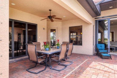Welcome to your dream home--an elegant three-bedroom on Lakewood Ranch Golf and Country Club in Florida - for sale on GolfHomes.com, golf home, golf lot