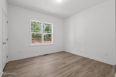 This newly constructed home is located in the community of Seven on Beacon Ridge Golf and Country Club in North Carolina - for sale on GolfHomes.com, golf home, golf lot
