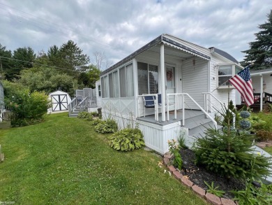 1970 Single Wide open concept, completely furnished home, sits on Huron Shores Golf Club in Michigan - for sale on GolfHomes.com, golf home, golf lot