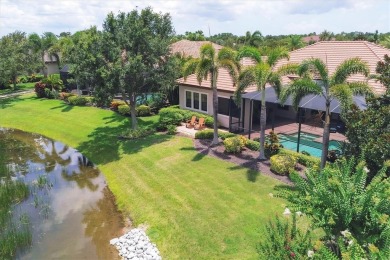 Welcome to your dream home--an elegant three-bedroom on Lakewood Ranch Golf and Country Club in Florida - for sale on GolfHomes.com, golf home, golf lot