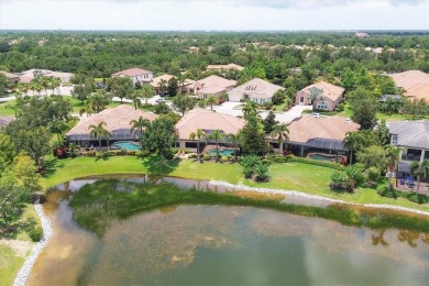 Welcome to your dream home--an elegant three-bedroom on Lakewood Ranch Golf and Country Club in Florida - for sale on GolfHomes.com, golf home, golf lot