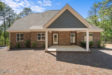 This newly constructed home is located in the community of Seven on Beacon Ridge Golf and Country Club in North Carolina - for sale on GolfHomes.com, golf home, golf lot