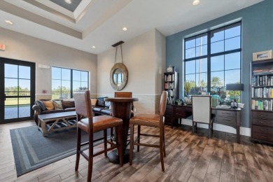 Welcome to your dream home--an elegant three-bedroom on Lakewood Ranch Golf and Country Club in Florida - for sale on GolfHomes.com, golf home, golf lot
