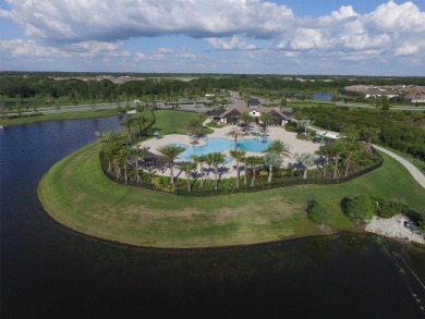 Welcome to your dream home--an elegant three-bedroom on Lakewood Ranch Golf and Country Club in Florida - for sale on GolfHomes.com, golf home, golf lot