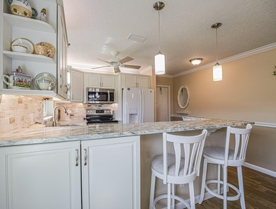 Elegantly updated 2/2 (B Unit) in Vista Royale. Enjoy the on The American Golf Club in Florida - for sale on GolfHomes.com, golf home, golf lot