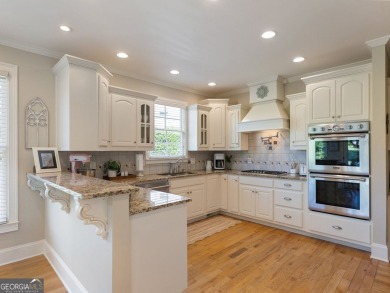 Welcome home to 70 Baker Pond Ct - a rare and timeless retreat on Traditions of Braselton Golf Club in Georgia - for sale on GolfHomes.com, golf home, golf lot