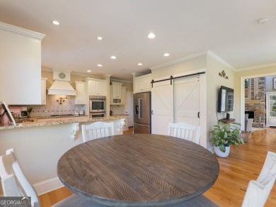 Welcome home to 70 Baker Pond Ct - a rare and timeless retreat on Traditions of Braselton Golf Club in Georgia - for sale on GolfHomes.com, golf home, golf lot