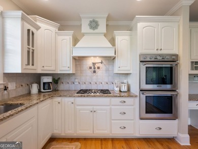 Welcome home to 70 Baker Pond Ct - a rare and timeless retreat on Traditions of Braselton Golf Club in Georgia - for sale on GolfHomes.com, golf home, golf lot