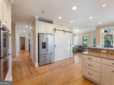Welcome home to 70 Baker Pond Ct - a rare and timeless retreat on Traditions of Braselton Golf Club in Georgia - for sale on GolfHomes.com, golf home, golf lot