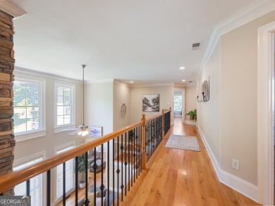 Welcome home to 70 Baker Pond Ct - a rare and timeless retreat on Traditions of Braselton Golf Club in Georgia - for sale on GolfHomes.com, golf home, golf lot
