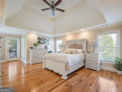 Welcome home to 70 Baker Pond Ct - a rare and timeless retreat on Traditions of Braselton Golf Club in Georgia - for sale on GolfHomes.com, golf home, golf lot