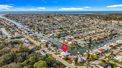 Waterfront opportunity in highly sought-after Gulf Harbors. This on Gulf Harbors Golf Course in Florida - for sale on GolfHomes.com, golf home, golf lot