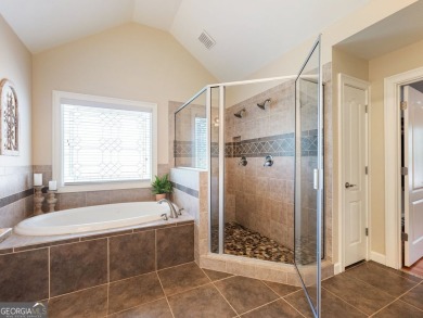 Welcome home to 70 Baker Pond Ct - a rare and timeless retreat on Traditions of Braselton Golf Club in Georgia - for sale on GolfHomes.com, golf home, golf lot
