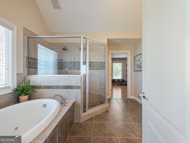 Welcome home to 70 Baker Pond Ct - a rare and timeless retreat on Traditions of Braselton Golf Club in Georgia - for sale on GolfHomes.com, golf home, golf lot