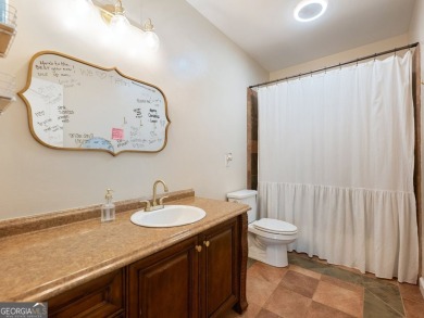 Welcome home to 70 Baker Pond Ct - a rare and timeless retreat on Traditions of Braselton Golf Club in Georgia - for sale on GolfHomes.com, golf home, golf lot